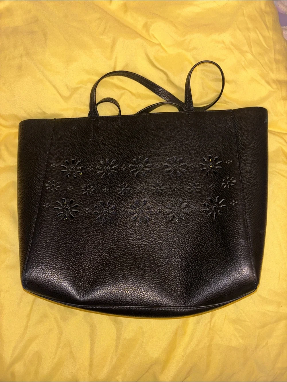 kate spade black leather tote with floral cutouts